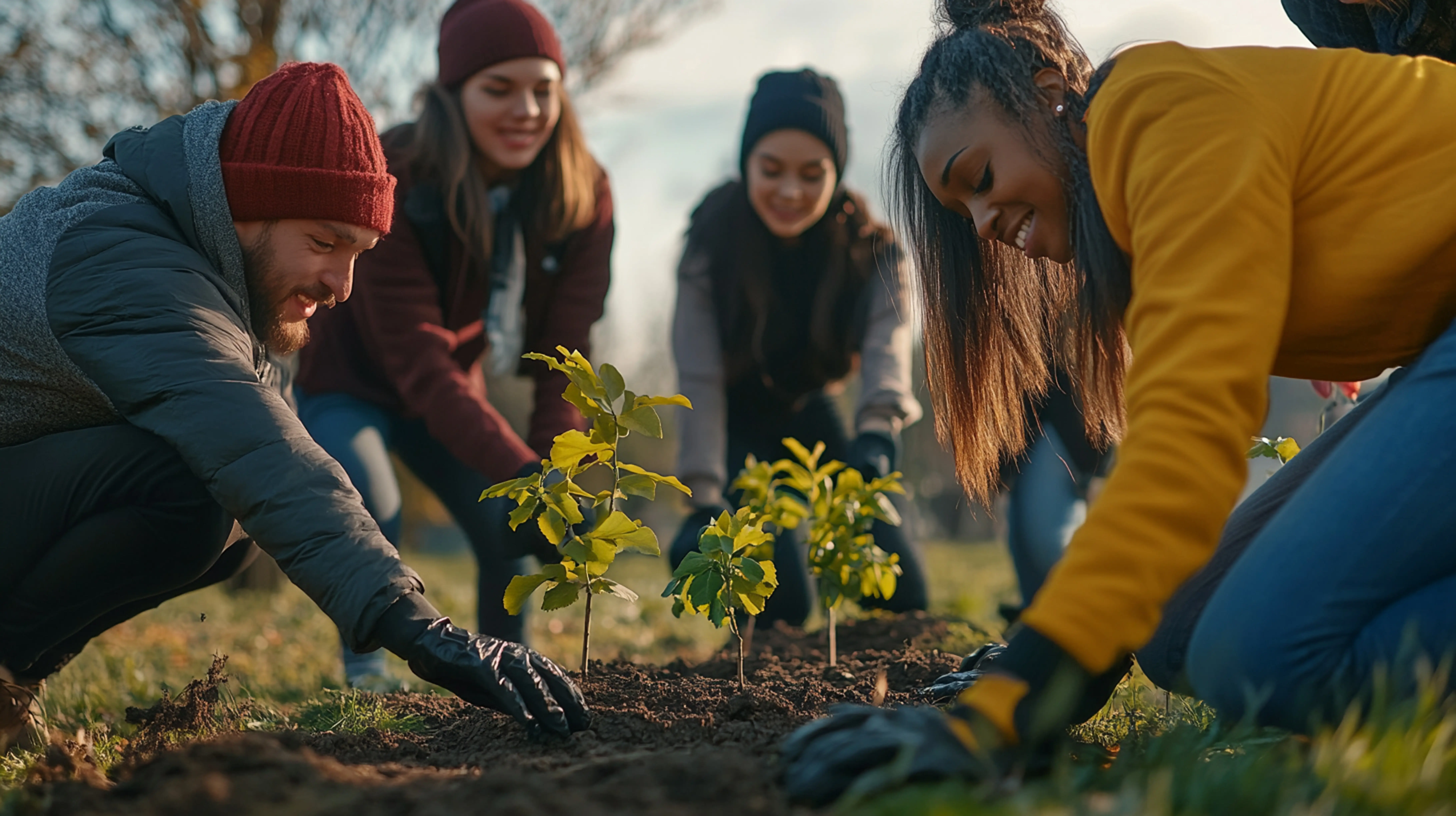 Vielfältige Gruppe von Freiwilligen, die sich dafür engagiert, durch ihren Einsatz positive Veränderungen in ihrer Gemeinschaft zu bewirken.